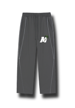 Load image into Gallery viewer, HELMET LOGO REFLECTIVE STRIPED SWEATPANTS
